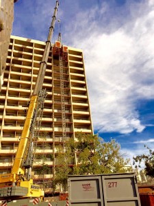 Brewer Crane working on tall building