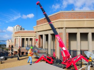 Brewer Crane workers on rooftop